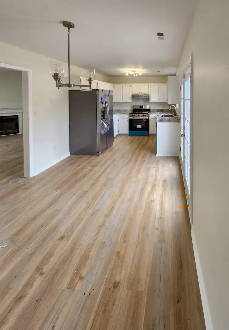 New flooring, painting, and kitchen remodel by Wynn Building Construction