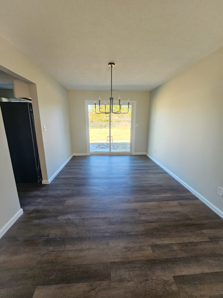 new floors and paint in renovated room by Wynn Building Construction