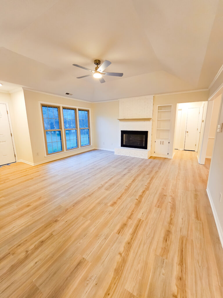 new flooring, painting and trim in a remodel by Wynn Building Construction, a remodeling contractor serving coastal carolina