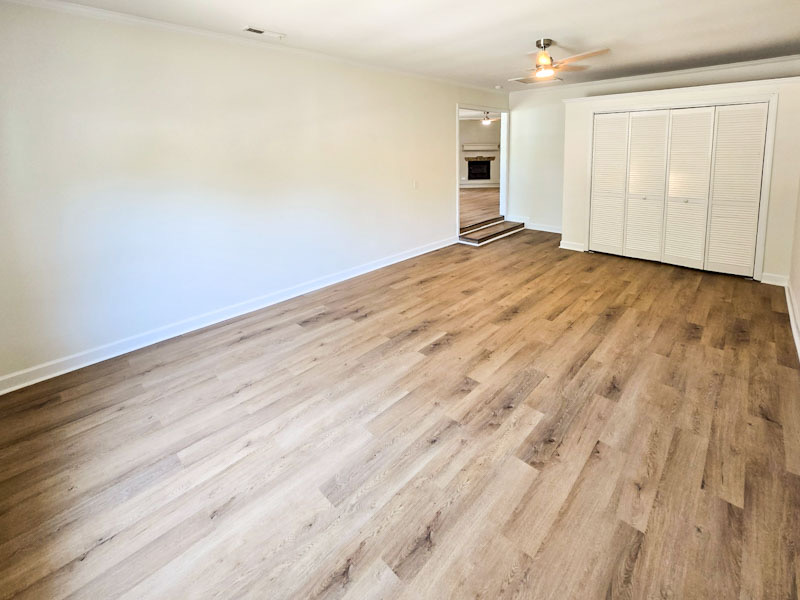 newly remodeled floor with fresh paint on walls